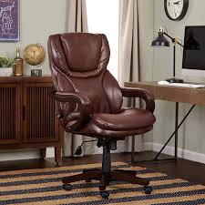 Big and tall chair is tested to support up to 400 lbs. Amazon Com Serta Big And Tall Executive Office Chair With Wood Accents Adjustable High Back Ergonomic Lumbar Support Bonded Leather Chestnut Brown Furniture Decor