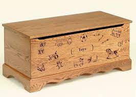 roswell oak wood toy chest with carving