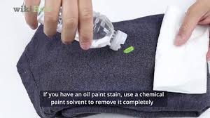 how to remove paint from clothes water