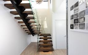 The look of timber with the dark wall and all the natural light. Staircase Design Ideas Gallery Ackworth House