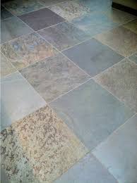 dull slate floor tile before cleaning