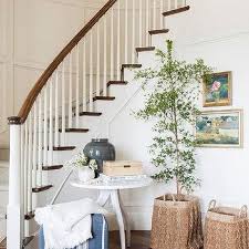 Curved Staircase Wall Table Design Ideas