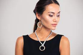 jewelry to wear with a black dress for