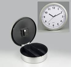This Wall Clock Swings Open To Reveal A