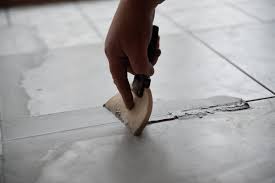 how to regrout tile without removing
