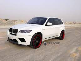 white bmw x5 on contrasting matte black