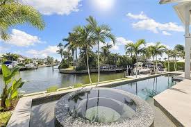 homes with pool in naples fl