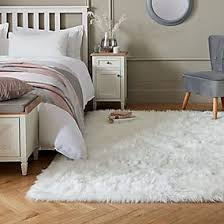 Brush or vacuum your rug regularly to remove surface dirt using a suction only vacuum cleaner. Faux Fur Rugs White Grey Pink Black Dunelm
