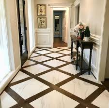 Maybe you would like to learn more about one of these? Marble Meets Wood Design Wood Floor Design Entryway Flooring Marble Flooring Design