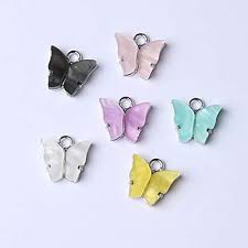 These butterfly charms are created with a rubber stamp and colored with permanent markers. Amazon Com 60pcs Mix Alloy Butterfly Setting Acrylic Charms Lovely Diy Animal Pendant Handmade Jewelry For Necklace Bracelet