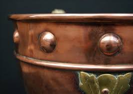 A Small Copper Coal Bucket With Brass