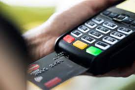 Department stores traditionally require the cashier to swipe the card, though some stores now have customers swipe the card themselves. Retail Store Business Owner Using Credit Card Terminal Free Stock Photo Picjumbo