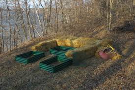 can you build a raised bed on a slope