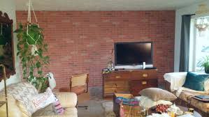 living room makeover faux brick wall