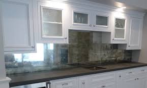 Antique mirror glass creates a very attractive feature in kitchens and bathrooms. Backsplash