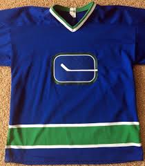 The ice hockey team vancouver canucks has had three different logos. Vancouver Canucks Nhl Hockey Jersey Blue Vintage Stick Logo Sewn Ak Men Xxl 1868358547