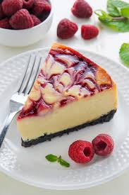 Spread over a layer of cream, squish in some raspberries, then repeat with another layer of biscuits, pressing down slightly to stick. Raspberry Cheesecake Recipe