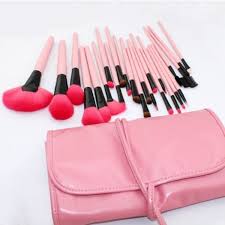 makeup brush set in pink and black with