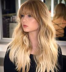 Do not go cutting huge chunks off at once, that is most likely going to be fringe suicide. 23 Perfectly Flattering Long Hairstyles With Bangs Stylesrant