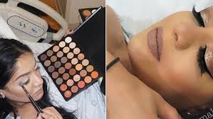 woman does makeup in between