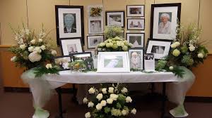 memorial table with diffe flowers