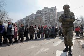 Mariupol says 15,000 deported from besieged city to Russia | Reuters