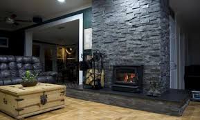 Primarily black in color, this natural split face panel is used to create beautiful design features including accent walls, fireplace walls, and for exterior projects including cladding of structures and. Natural Stacked Stone Veneer Fireplace Stone Fireplace Ideas