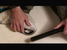 how to remove fibergl shower pan