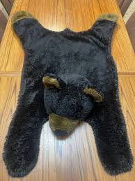 rbi plush black bear rug wall hanging