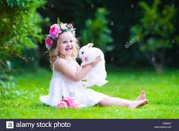 Image result for kids playing with animals