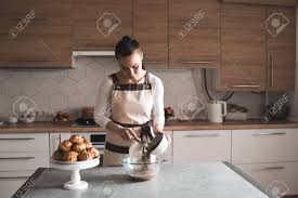 How to make a nail drag. Young Woman 25 30 Year Old Cooking Homemade Chocolate Cake At Stock Photo Picture And Royalty Free Image Image 150972149
