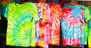 Pinch the center of the fabric and spin it tightly until you have a flat, circular puck. The Entire History Of The Tie Dye Shirt Updated July 2020 The Adair Group