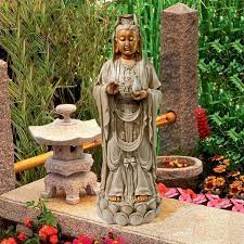 Goddess Guan Yin Standing On A Lotus