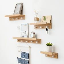 Get a mirror that is functional with this natural wood wall mirror with shelf and hangers. Handmade Wooden Wall Shelves Wood Mail Rack Wooden Hanger Rack Hook Keychain Doorway Solid Wood Decorative Wall Shelves Wall Shelves Hooks Fixtures Home Living Vadel Com