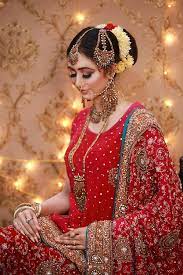 photo bride with red dress bridal makeup
