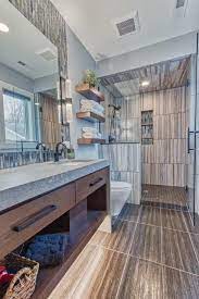 Master Bath With Brown Tile Flooring