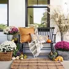 Outdoor rug available from pottery barn. 15 Festive Fall Porch Ideas You Ll Want To Copy Asap Better Homes Gardens