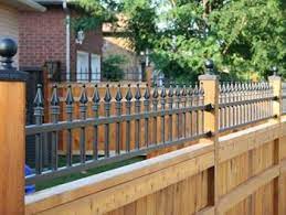 metal spike topped wood privacy fence