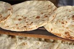 Is paratha the same as naan?