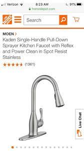 It is simply a matter of turning the showerhead neck upside down into the palm and vigorously shaking it. New Moen Faucet Has Almost No Pressure