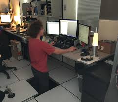 Desks that can raise and lower themselves automatically are awesome, but they're usually prohibitively expensive. My Coworker Decided He Wanted A Standing Desk Funny