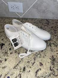 white canvas sneakers shoes