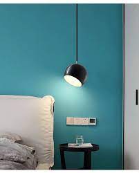 If you don't have a table, create the same effect by hanging the light just out from the bed frame so there is a clear visual link between the light and the bed. Modern Bedside Rotatable Pendant Light Adjustable Head Nordic Ceiling Hangin Hanging Lights Living Room Hanging Pendant Lights Bedroom Pendant Lighting Bedroom