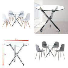 small round glass dining table and 4