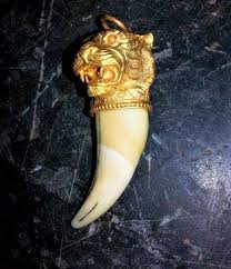 tiger claw pendants in gold huli uguru