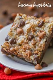 luscious layer bars a simple dessert idea topped with chocolate and erscotch chips coconut