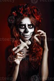 young woman with muertos makeup sugar