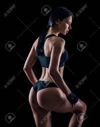 Sporty Female With Perfect Body Against Black Background Fitness