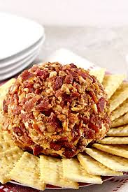 This spread is first formed into a ball which needs to be prepared hours ahead of serving place the cheese spread ingredients into a food processor and pulse until mixed. Bacon Cheese Ball And Other Easy Tailgate Foods Its Yummi
