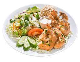 garlic shrimp with salad and brown rice